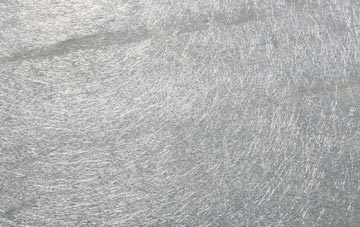 Over Whitacre laminate fibreglass or shingles?